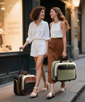 Two women walking with women's TSA rolling laptop bag, stylish and practical, perfect for travel and work. Large capacity 17.3-inch size.