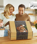 Couple opening All In One Sourdough Starter Kit With Pot 34 Oz Starter Jar 4 Banneton Baskets Scraper Scale Beginner Guide box