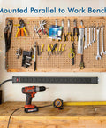 Beefy 16 Outlet Metal Power Strip With 10ft Cord Wall Mountable Garage Shop Power Strip in workshop setting against pegboard.