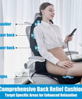 Woman using Portable Back Massager With Heat And Vibration For Deep Tissue Pain Relief In Shoulders, Back, and Thighs on office chair