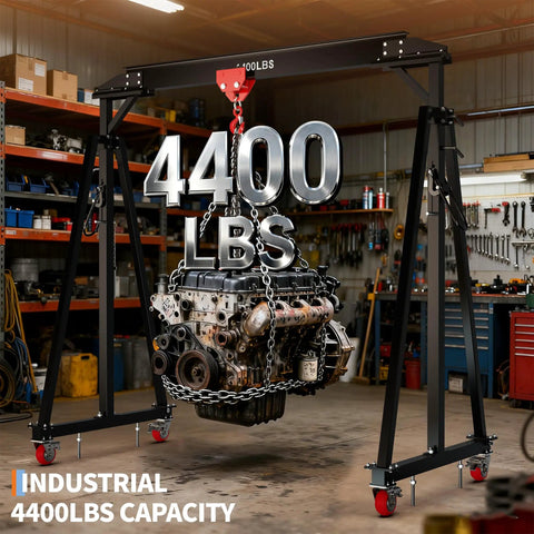 Built Like A Tank Adjustable Gantry Crane 2 Ton 4400 Lbs Capacity lifting an engine in a workshop on a mobile frame.