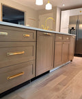 Solid Brass Cabinet Pull With Backplate, 6.5 Inch L-Shaped Handle In Polished Unlacquered Finish on kitchen cabinets