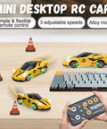 Mini One Sixty Four Scale RC Car With 2.4GHz Remote Control And 3 Speed Modes Rechargeable Desktop Toy Race Car Gift For Boys Ages Four To Twelve Yellow beside keyboard and traffic cones.