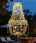 Outdoor Solar Crystal Pendant Lantern Chandelier, Waterproof Hanging Light With Warm White LED at night in garden