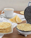 Cute Mini Electric Pizzelle Maker creates single 4 inch Italian waffle cookies with nonstick plates and compact design.