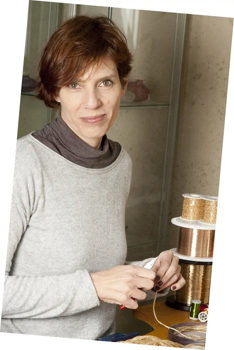 Person working with Go To Jewelry Making Kit For Beginners with wire and tools on a desk