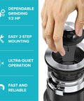 Hand installing 1/2-Horsepower Continuous-Feed Garbage Disposal With Ultra-Quiet Motor, Quick-Connect Mount and Stainless Steel Components.