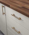 Champagne Bronze Adjustable Drawer Pulls 5 Pack Gold Cabinet Handles for Cupboards and Dressers Fits One And Three Eighths To Six And Five Sixteenths Inch Hole Centers Adjusta-Pull on white drawers