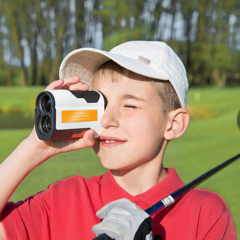 Boy using rangefinder with Custom Metallic Black Golf Club Labels With Silver Text near golf course