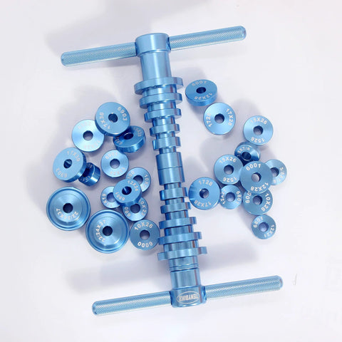Blue aluminum alloy bicycle bearing press set with multiple sizes for hub installation and repair, including 6000, 6800 series bearings.