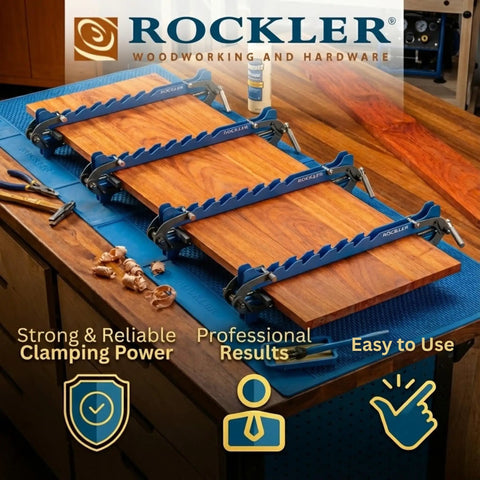 Mini Deluxe Panel Clamps 2-Pack, Boss-Grade Four-Way Pressure Cabinet Clamps on cutting board on workbench