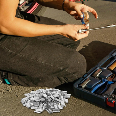 Heavy-Duty Steel Strapping Clips With Iron Buckles 1Kg Pack, manual strapping use with no tools, industrial shipping supplies shown