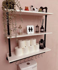 Industrial Pipe Shelving With Towel Rack 3 Tier 30 Inch Rustic White Floating Shelves with decor and toilet paper in bathroom