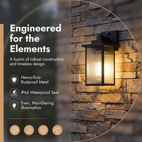 Set And Forget Dusk To Dawn Wall Mount Porch Light With Auto Photocell Sensor on stone wall, displaying matte black weatherproof metal design.