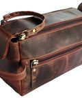 Genuine Full Grain Leather Toiletry Bag For Men Slick Travel Dopp Kit And Shaving Organizer Built Tough with handle detail.
