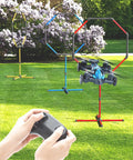 Racing RC Drone With Obstacle Course Kit Featuring Three Adjustable Hoop Sizes For Quick Race Action in outdoor setup