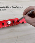 Tough As Nails Aluminum Woodworking Compass Scriber Smooth Operator adjustable metric and inch circle arc ruler in use on wood.