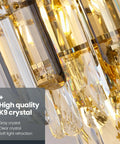 Close-up of the Modern K9 Crystal Wall Sconce with Gold Finish, showcasing gray and clear crystals for a luxury look.