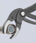 10 Inch Pipe And Connector Pliers With Push Button 25 Easy Adjustments gripping a metal connector in serrated jaws
