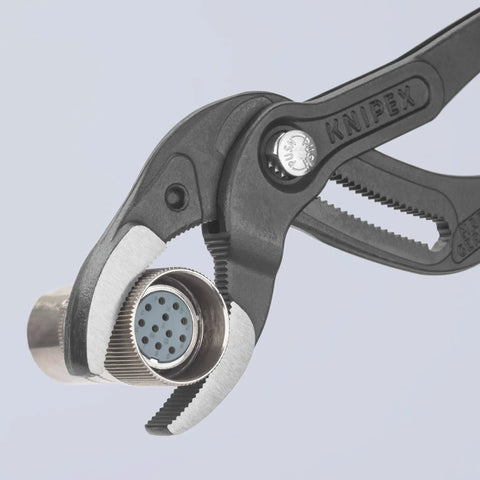 10 Inch Pipe And Connector Pliers With Push Button 25 Easy Adjustments gripping a metal connector in serrated jaws