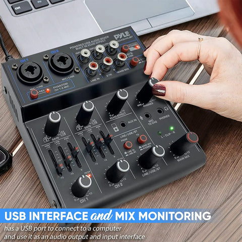 Person adjusting 4 Channel Wireless DJ Mixer With Bluetooth 5.x USB Audio Interface And 2 Combo Jacks XLR 6.35mm