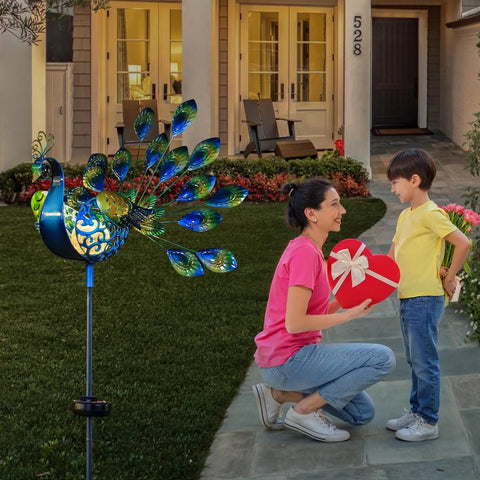 Peacock Solar Garden Stake Lights For Pathways And Backyard Decor Metal Outdoor Lights near porch with mother and child