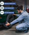 Men's Straight-Up Long Sleeve Twill Coverall Work Jumpsuit With Deep Cargo Pockets And Breathable Cotton Polyester Blend designed for mechanics adjusting a tire.