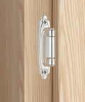 Self Closing Brushed Nickel Kitchen Cabinet Hinges For Face Frame Doors mounted on wooden cabinetry with screws.