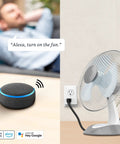 Person using Smart WiFi Plug Works With Alexa And Google Home No Hub Required 2 4 GHz Network to control a fan remotely.