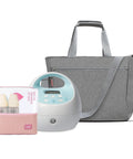 Hassle Free Portable Electric Breast Pump With Rechargeable Battery And Soft Suction Levels Includes Total Must Have Travel Tote Nursing Bottles And Insulated Cooler Bag For Busy Mom Life in gray with nursing bottles.