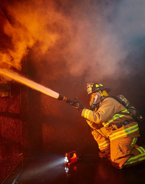 Firefighter using the Vulcan 180 Lantern Cranks Out 1200 Lumens With 548M Beam, 180-Degree Articulating Head That Locks Forward