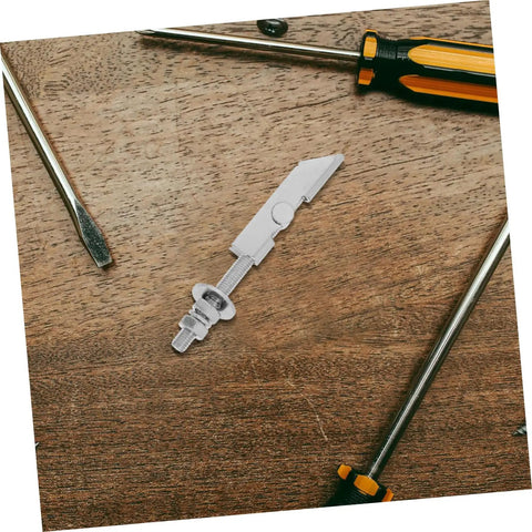 12 Pack Steel Toggle Bolts And Wing Nut Drywall Anchors Kit for Heavy Items on wooden surface with screwdrivers