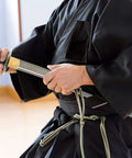 Person training with a Lightweight Aluminum Alloy Katana Iaito For Iaido Training With Unsharpened Blade 28 Inch Blade