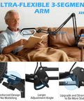 Man using the 12X Magnifying Glass With Light And Clamp, Ultra Long 3-Section Arm, 5.3x3.2 Inch Glass Lens for reading on a couch.