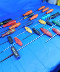 Pro Grade Hardened Steel Torx Drivers 25 Piece Assorted Sizes T9 To T40 Heavy Duty Repair Kit For Mechanics And Handymen on blue background.