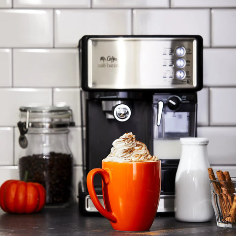 Three In One Espresso And Cappuccino Machine With Stainless Steel Body Programmable Coffee Maker on kitchen countertop with orange mug