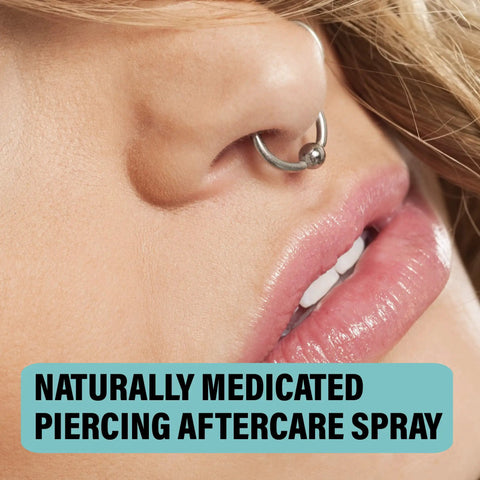 Nose piercing close-up with hoop jewelry; Piercing Aftercare Spray Isotonic Saline Cleanser For New And Existing Piercings 4 Oz