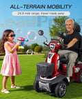 Man riding a heavy duty mobility scooter for seniors with 450 lb capacity, 500W motor, 12 mph top speed, in a park setting.