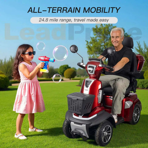 Man riding a heavy duty mobility scooter for seniors with 450 lb capacity, 500W motor, 12 mph top speed, in a park setting.