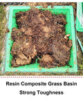 Composite Resin Manhole Cover For Outdoors Heavy Duty Sump Pump Access Lid with grass and soil in a green drainage basin.
