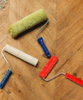Professional Grade Slick Wood Grain Texture Paint Roller For Interior Wall Decoration on wooden floor.