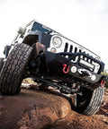 Off-road vehicle equipped with AWS Aluminum Winch Shackle For Safer, Stronger Off Road Recovery Up To 20,000 Lbs Fits Synthetic Rope