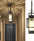 Top Shelf Modern Black Metal Motion Sensor Outdoor Pendant Light Slick Finish Exterior Hanging Lantern With Smart PIR Detection And Auto Night Glow For Front Porch And Entryway over a black door.