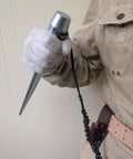 Person holding Beefed-Up Heavy Duty Broad Head Bull Pin Alignment Punches Cone From 1-1/4 In To 5/16 In 13.75 In Long Heat Treated