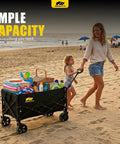 Woman and child using Foldable Wagon Cart With Drop Down Tailgate For Groceries And Gear, Heavy Duty Utility Beach Cart on sandy beach