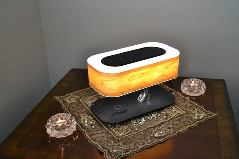 Bedside Tree Lamp With Bluetooth Speaker And Wireless Qi Charging Led Dimming Night Light on decorated wooden table