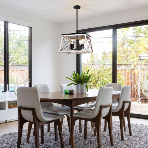 Farmhouse Chandelier For Dining Room And Kitchen Island Rustic White Wood Pendant Light Distressed Four Light Ceiling Fixture Large Hanging Ceiling Lantern For Entryway Hallway Foyer With Barn Chic Vibe That Pops In Any Room hanging above a dining table.