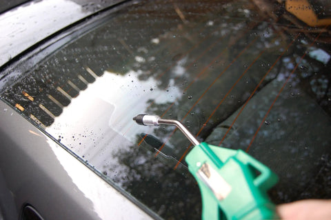 Deluxe Four Inch Air Blow Gun With Removable One Half Inch Tip Green Finish used to clean car window surface