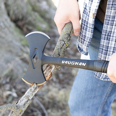 Person using Stealth Dual Bit Axe For Outdoors Beefy Built Hand Axe With Steel Handle And Shock Block Grip Ideal For Camp Tasks