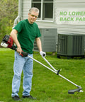 Man using Ergonomic Weedeater Handle Extension For String Trimmer Keeps You Standing Up Straight And A Back Saver For Edging And Trimming 17.7 Inch Lawn Care And Landscaping for no lower back pain